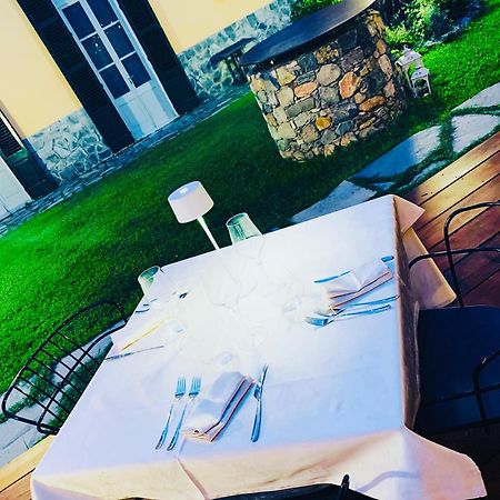 Отель Relais Real Collegio Ноли Экстерьер фото