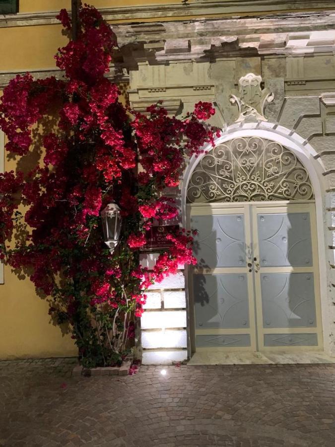 Отель Relais Real Collegio Ноли Экстерьер фото