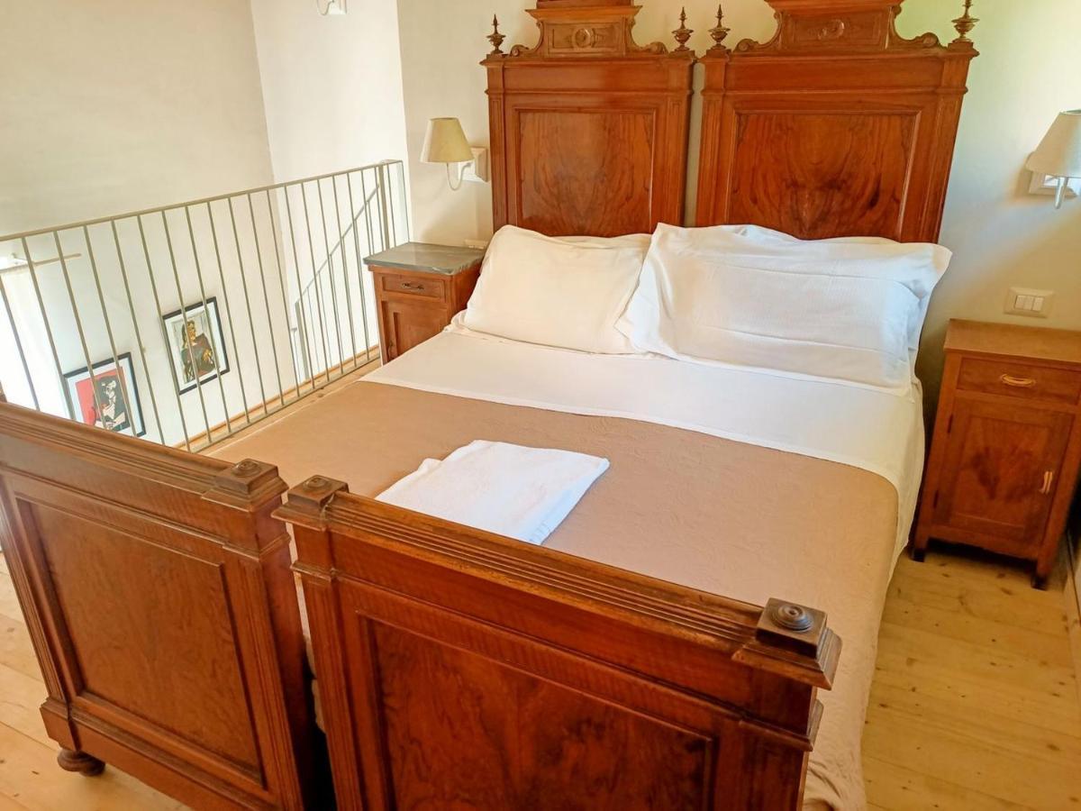 Отель Relais Real Collegio Ноли Экстерьер фото