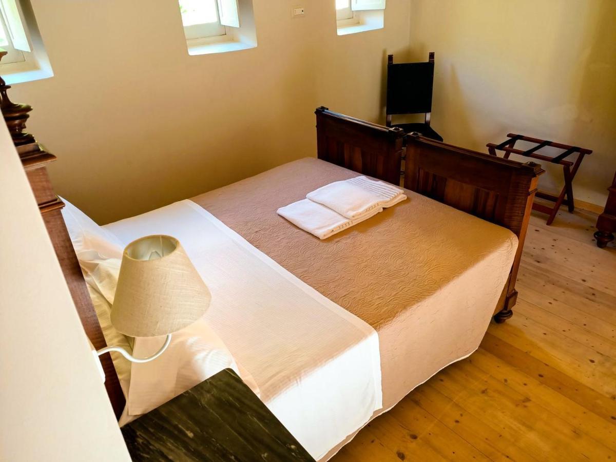 Отель Relais Real Collegio Ноли Экстерьер фото