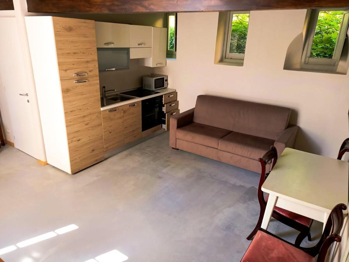 Отель Relais Real Collegio Ноли Экстерьер фото