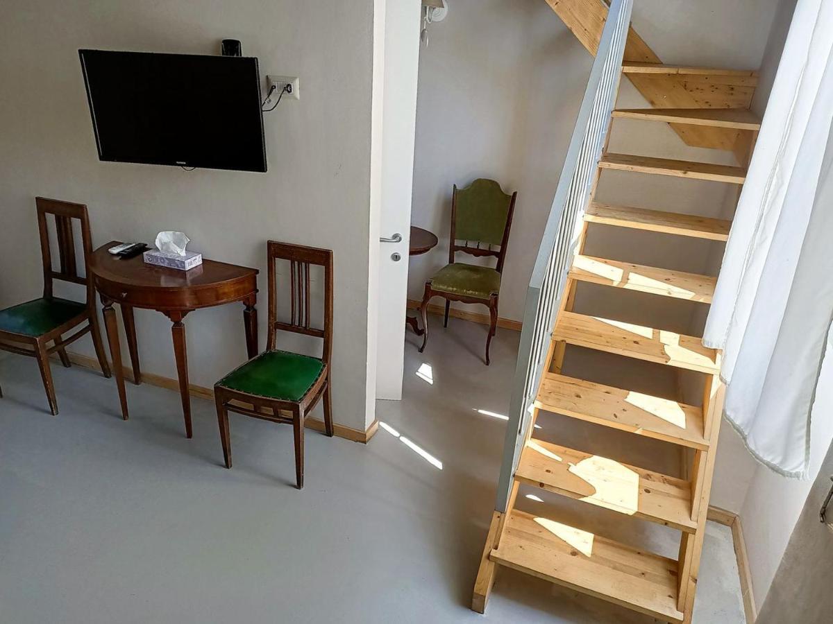 Отель Relais Real Collegio Ноли Экстерьер фото