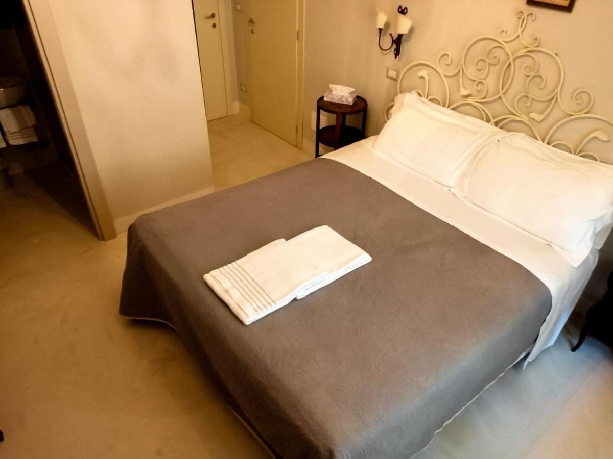 Отель Relais Real Collegio Ноли Экстерьер фото