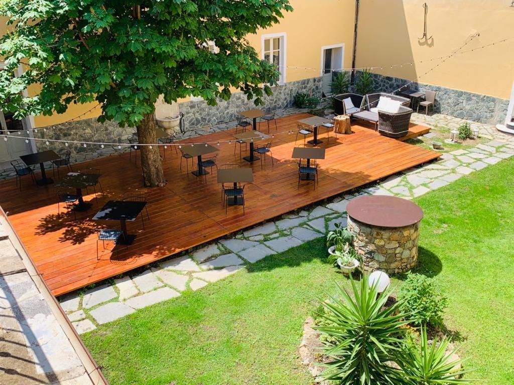 Отель Relais Real Collegio Ноли Экстерьер фото
