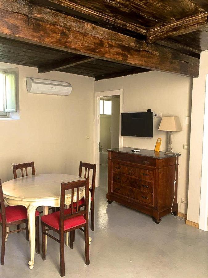Отель Relais Real Collegio Ноли Экстерьер фото