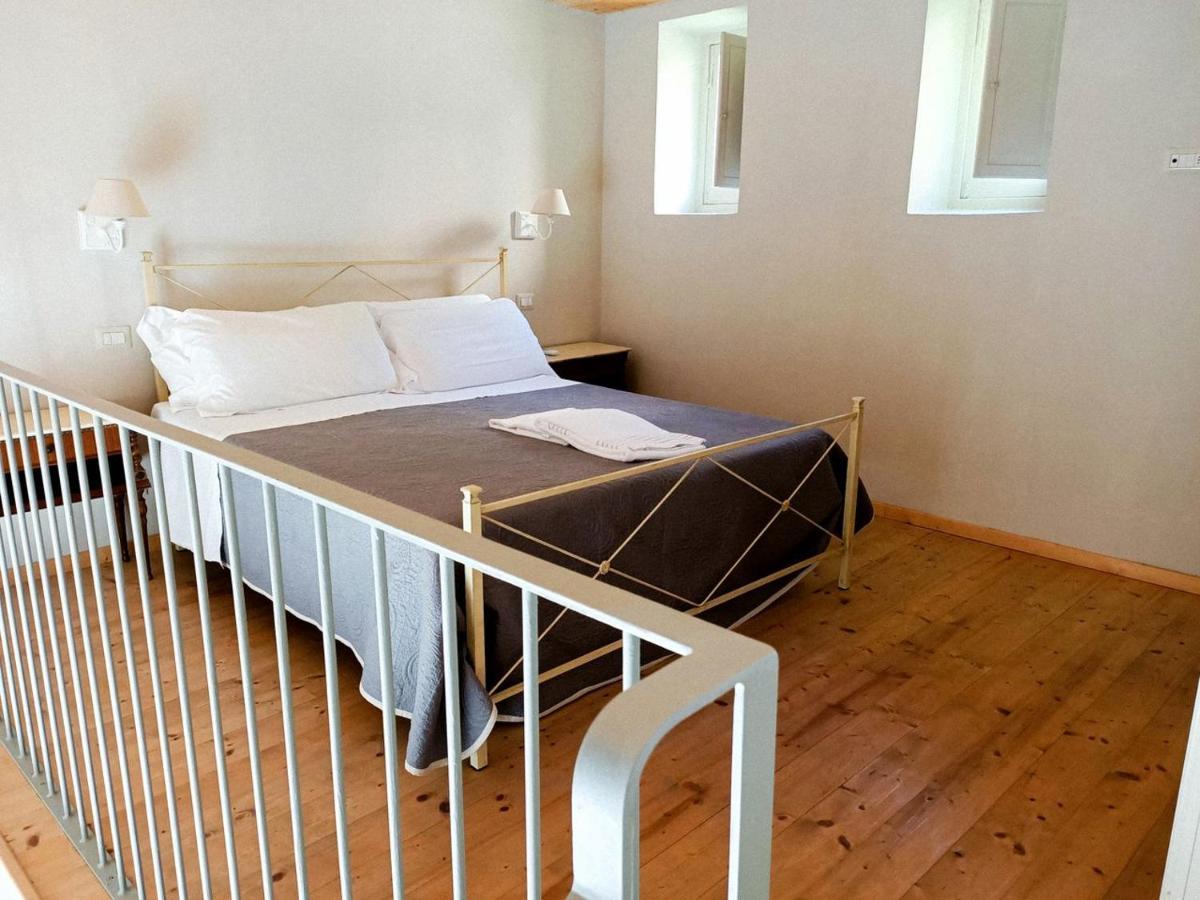 Отель Relais Real Collegio Ноли Экстерьер фото