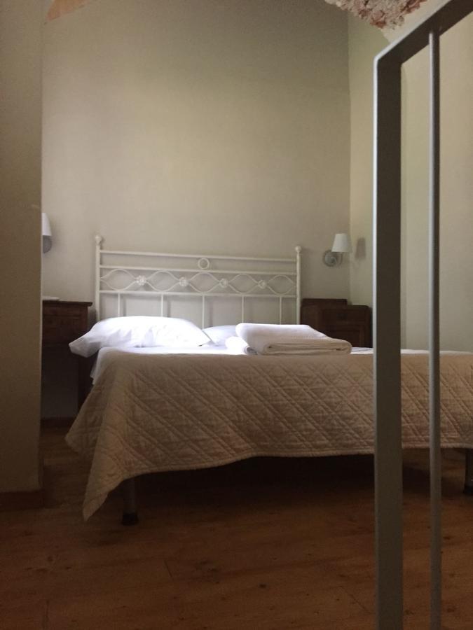 Отель Relais Real Collegio Ноли Экстерьер фото