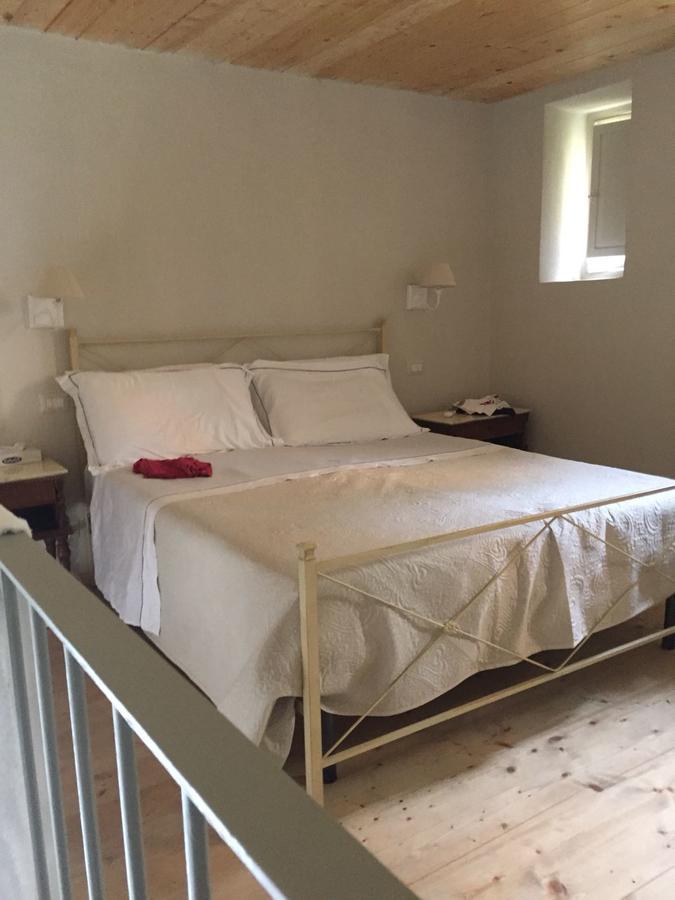 Отель Relais Real Collegio Ноли Экстерьер фото